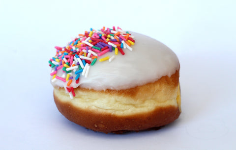 White Iced Sprinkle Custard Donuts